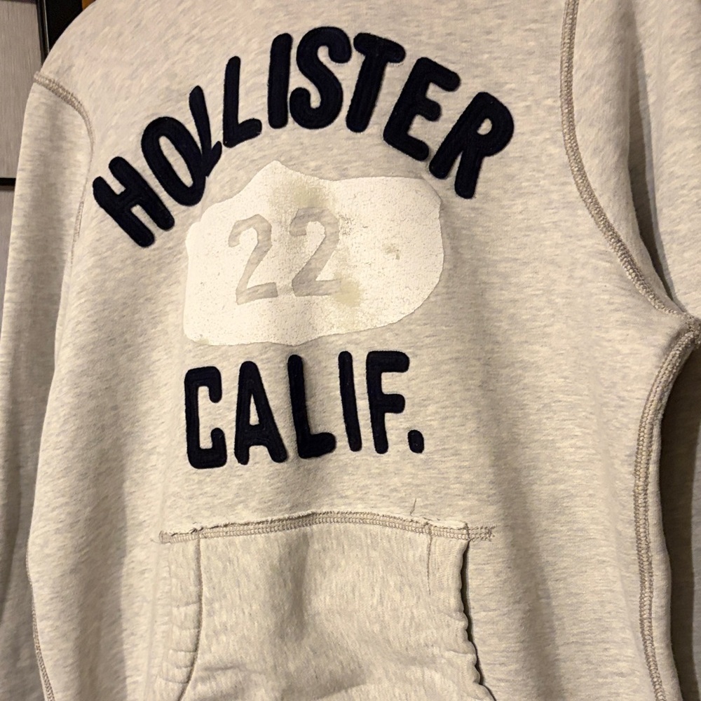 Hollister Light Gray Pullover Sweatshirt with Navy Appliqué